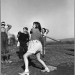 girl swinging baseball bat 1